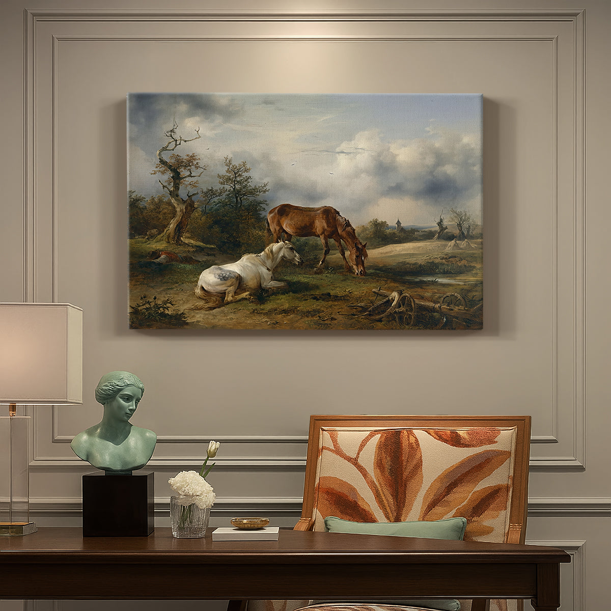 Canvas art print featuring two horses grazing in open pasture, presented within a refined interior setting
