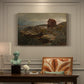 Canvas art print featuring a coastal home near shoreline with boats and surrounding landscape, presented within a refined interior setting