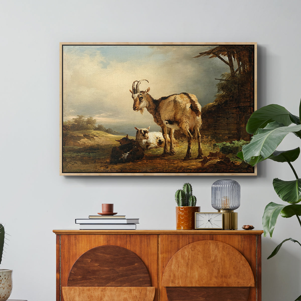 A Goat with Two Kids - Floater Framed Canvas Print