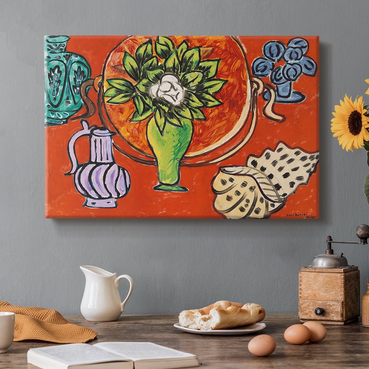 Canvas art print featuring magnolia flowers arranged in a vase within a patterned still life, set in a cozy kitchen setting
