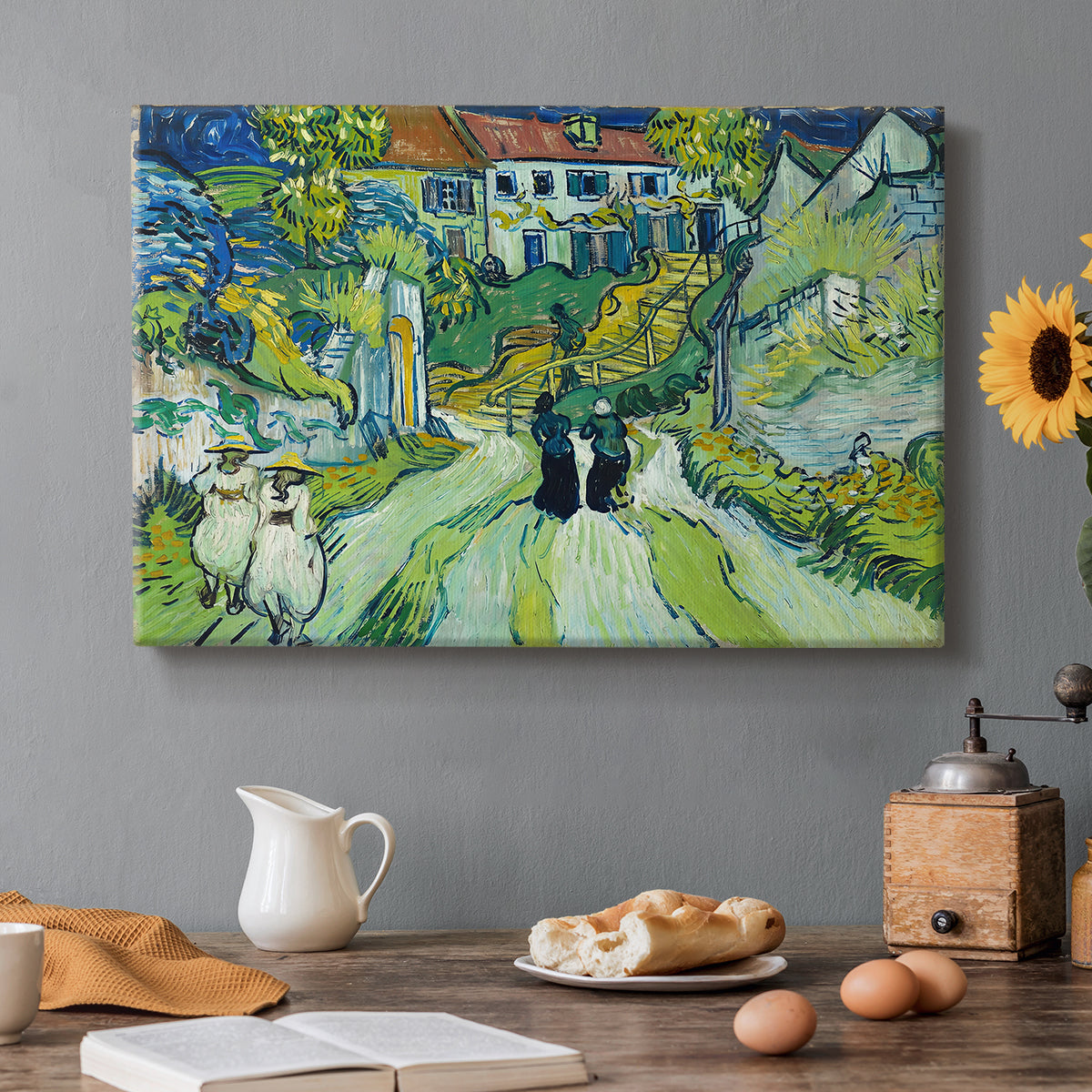 Canvas art print featuring a steep stairway between buildings leading upward through village setting, set in a cozy kitchen setting