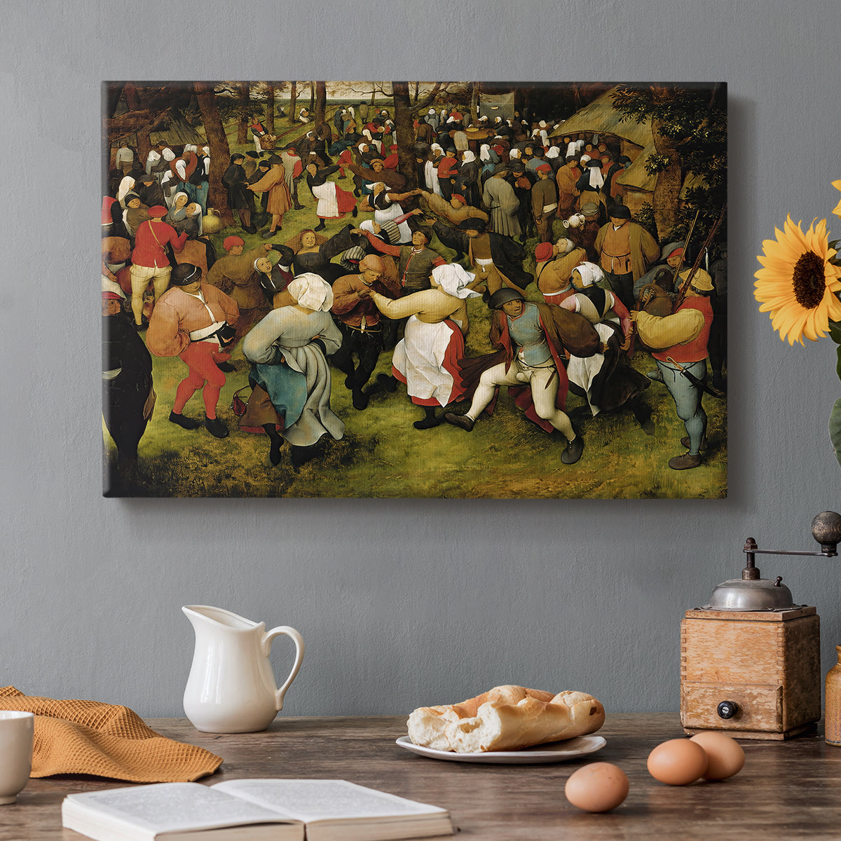 Canvas art print featuring figures dancing in crowded outdoor scene, set in a cozy kitchen setting