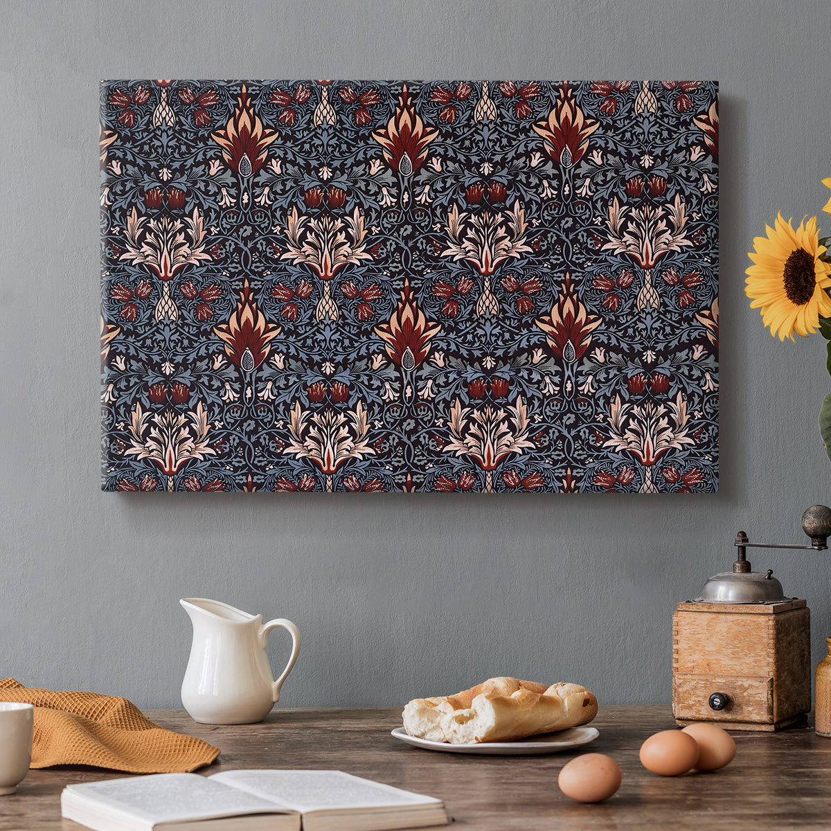 Canvas art print featuring a repeating pattern of stylized flowers with curved stems in contrasting indigo and red tones, set in a cozy kitchen setting