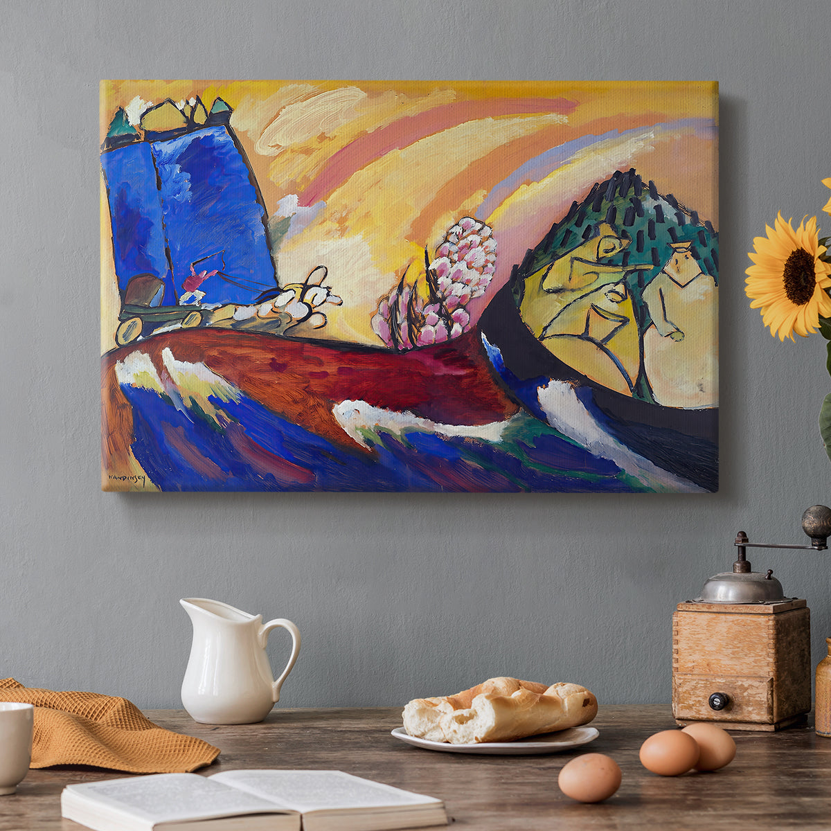 Canvas art print featuring abstracted figures and horses suggested through sweeping lines and vibrant colors, set in a cozy kitchen setting