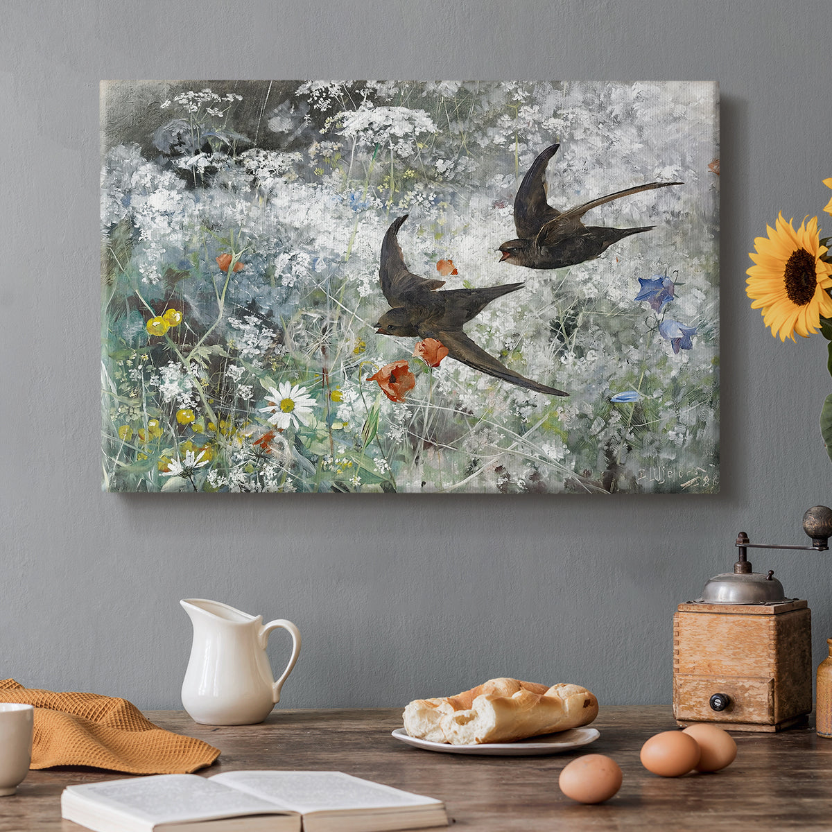 Canvas art print featuring a flock of birds in flight soaring across open sky above landscape, set in a cozy kitchen setting