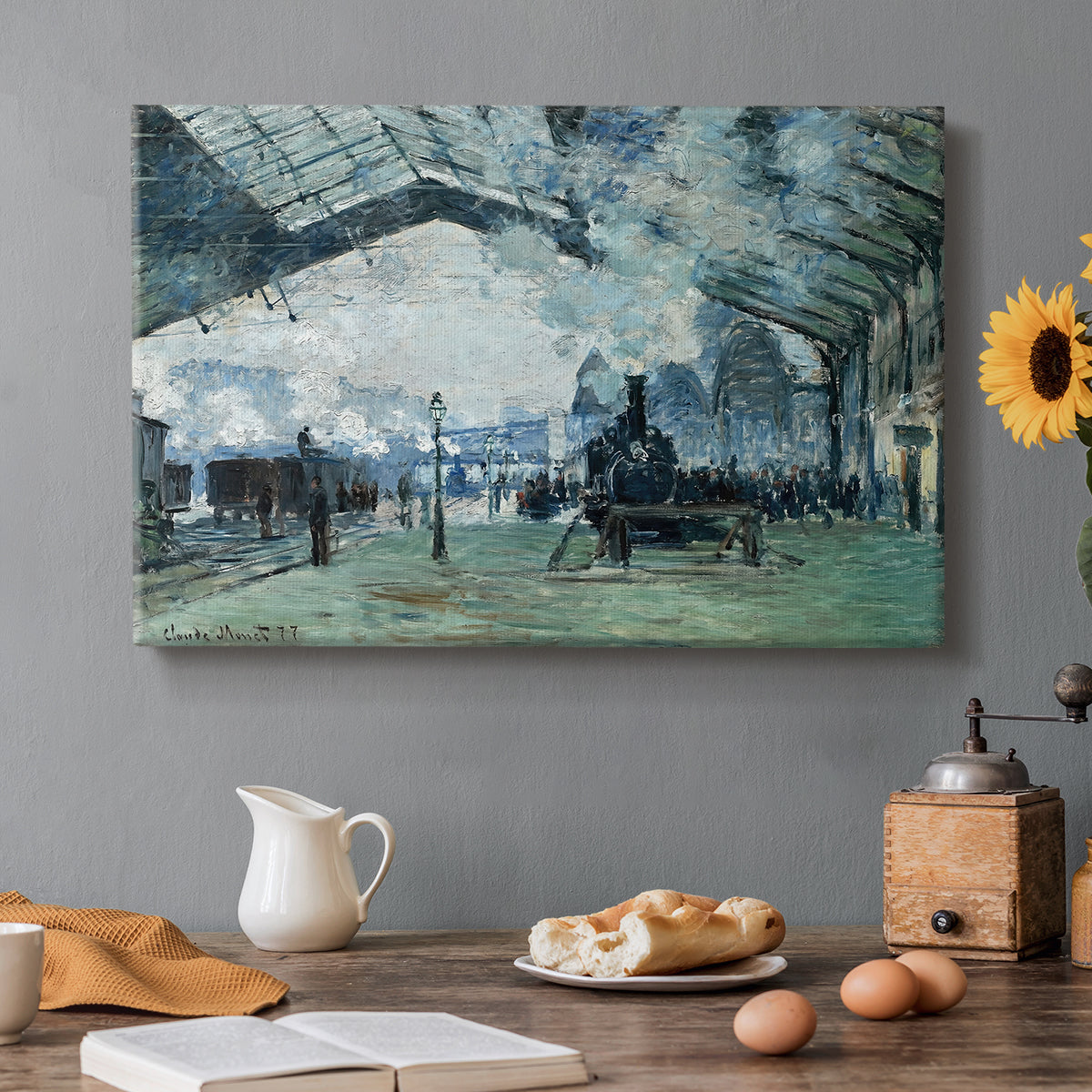 Canvas art print featuring trains arriving under large arched station roof with billowing steam, set in a cozy kitchen setting