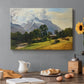 Canvas art print featuring an alpine mountain landscape with towering peaks and valley below, set in a cozy kitchen setting