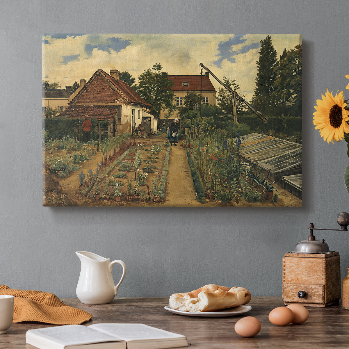 Canvas art print featuring a flower garden with plants and building in structured outdoor setting, set in a cozy kitchen setting