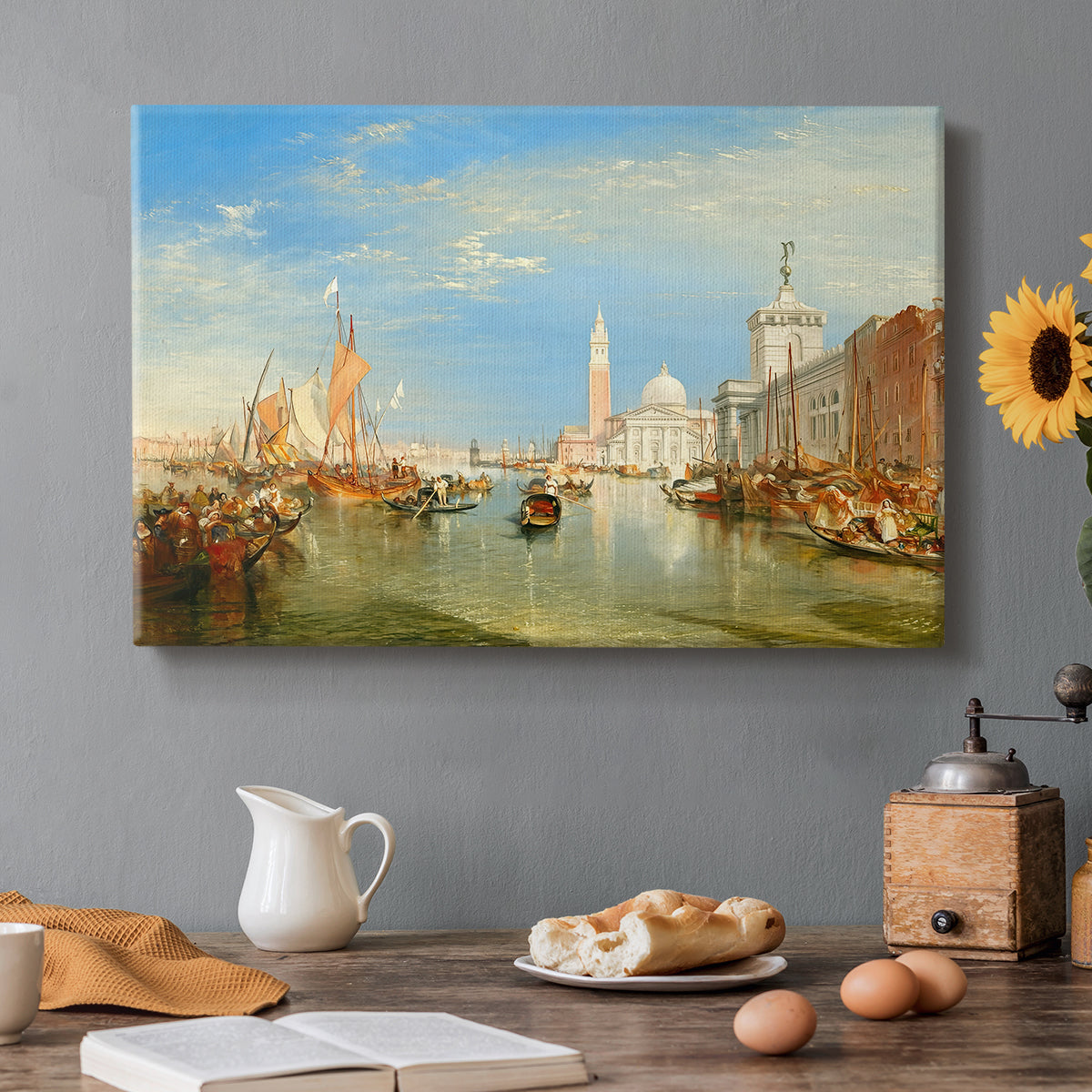Canvas art print featuring a Venetian waterfront with boats and iconic buildings, set in a cozy kitchen setting