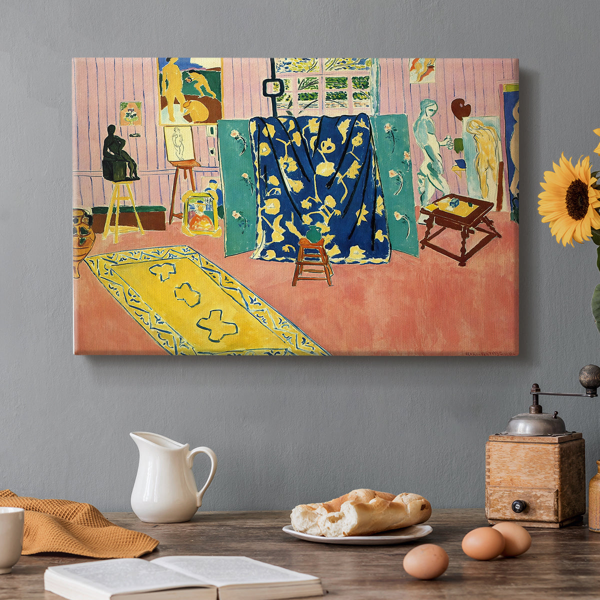 Canvas art print featuring a studio interior filled with objects in pink tones, set in a cozy kitchen setting