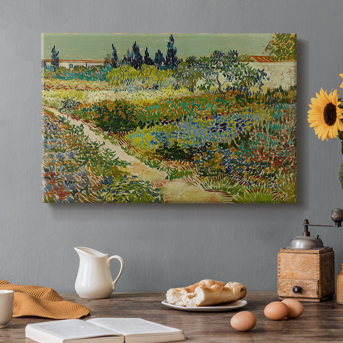Canvas art print featuring a lush garden filled with plants and flowers arranged in bright sunlight, set in a cozy kitchen setting
