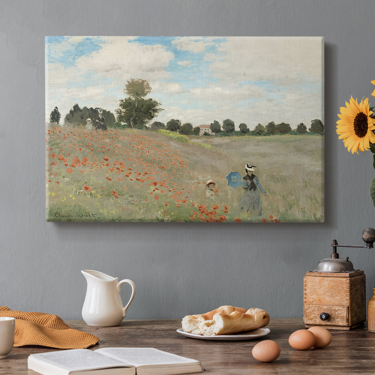 Canvas art print featuring a field of red poppies with figures walking across rolling landscape, set in a cozy kitchen setting
