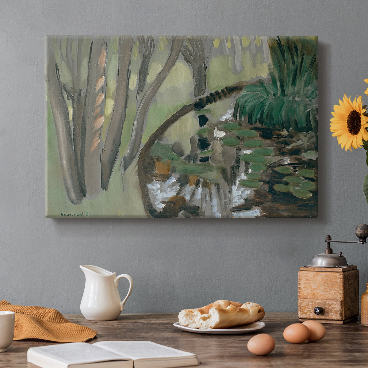 Canvas art print featuring a stream flowing through green landscape, set in a cozy kitchen setting