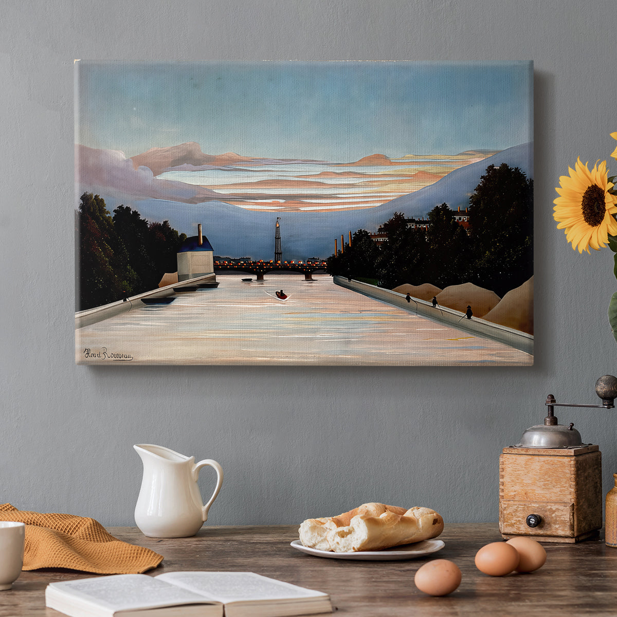 Canvas art print featuring the Eiffel Tower rising above landscape with trees and open sky, set in a cozy kitchen setting