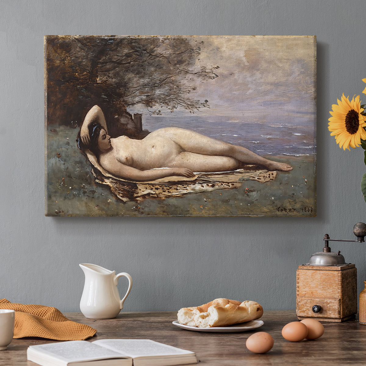 Canvas art print featuring a reclining female figure near shoreline with calm water behind, set in a cozy kitchen setting