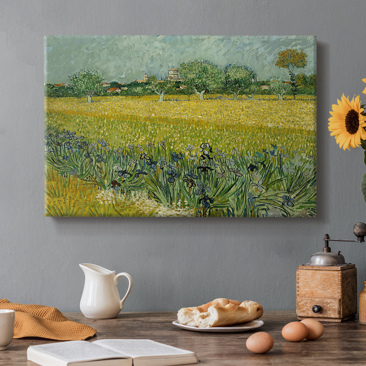 Canvas art print featuring an open field filled with irises stretching across landscape under bright sky, set in a cozy kitchen setting