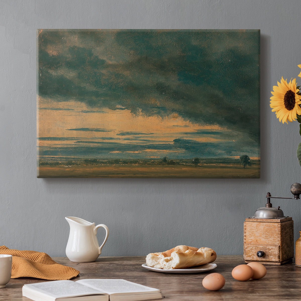 Canvas art print featuring an expansive sky filled with layered cloud formations, set in a cozy kitchen setting