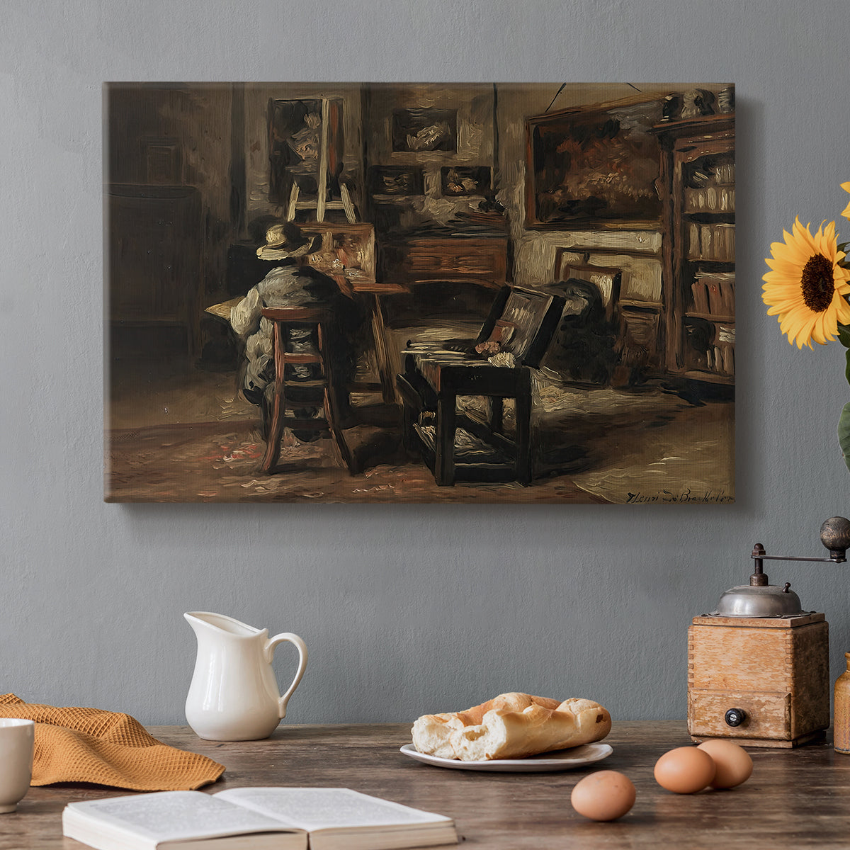Canvas art print featuring an artist’s studio interior filled with furniture, tools, and paintings under soft light, set in a cozy kitchen setting