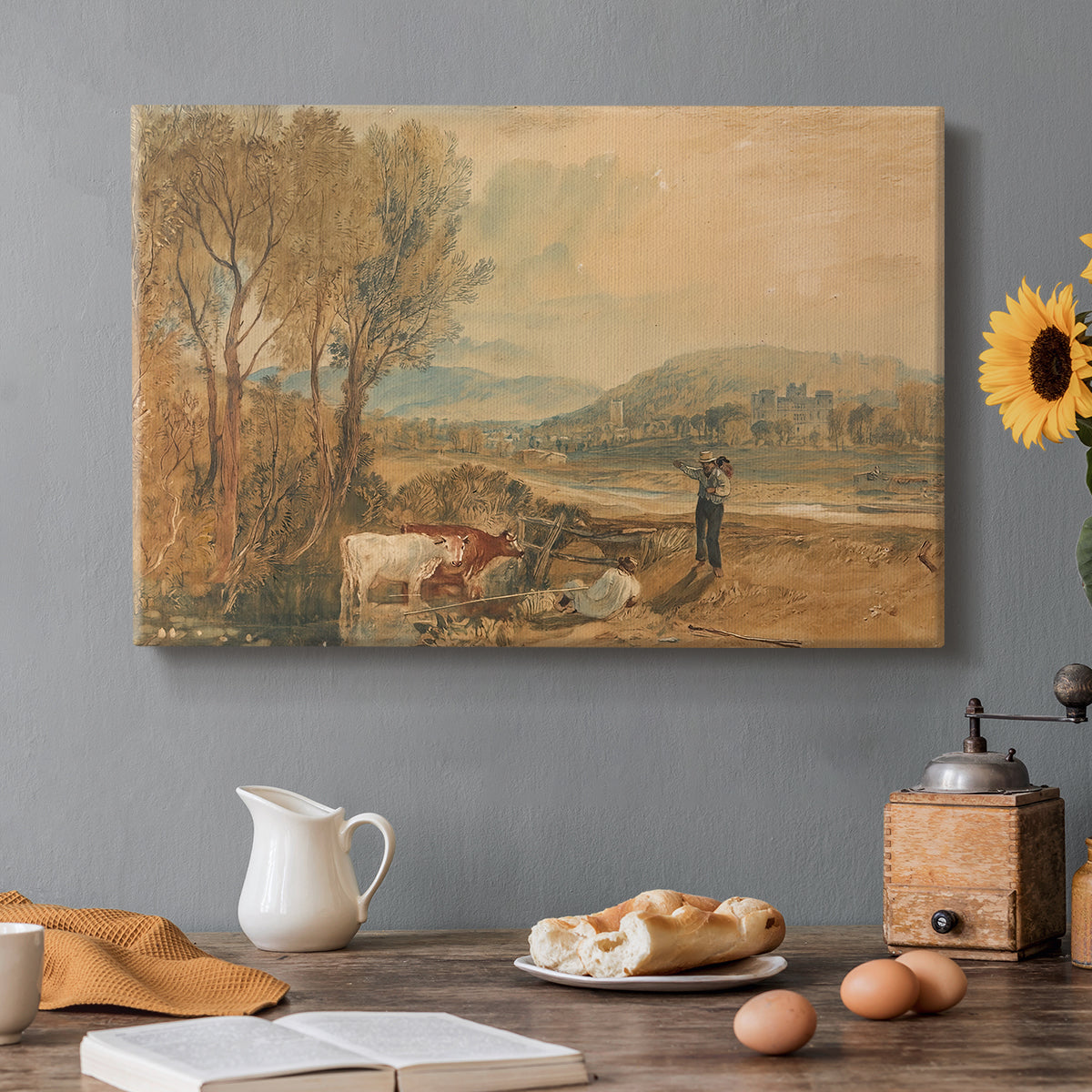 Canvas art print featuring a castle surrounded by open landscape under sky, set in a cozy kitchen setting