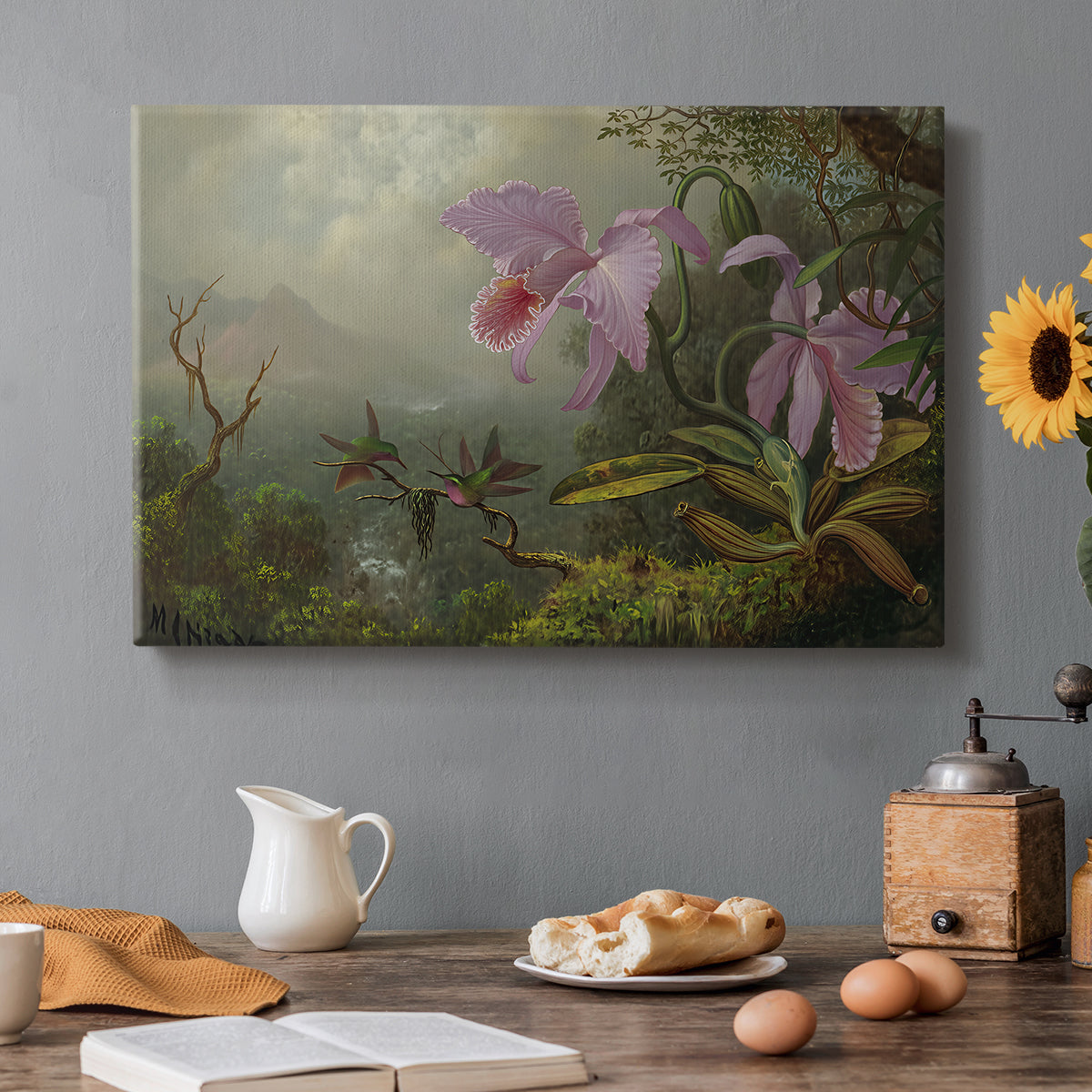 Canvas art print featuring two hummingbirds perched on branch with foliage, set in a cozy kitchen setting