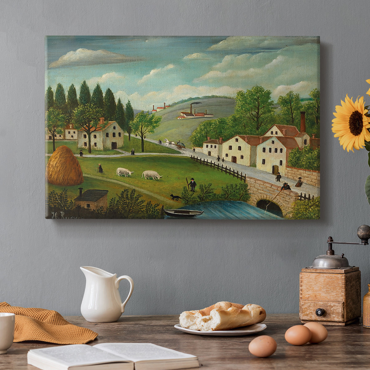 Canvas art print featuring a rural landscape with stream, walking figures, and fisherman near water, set in a cozy kitchen setting