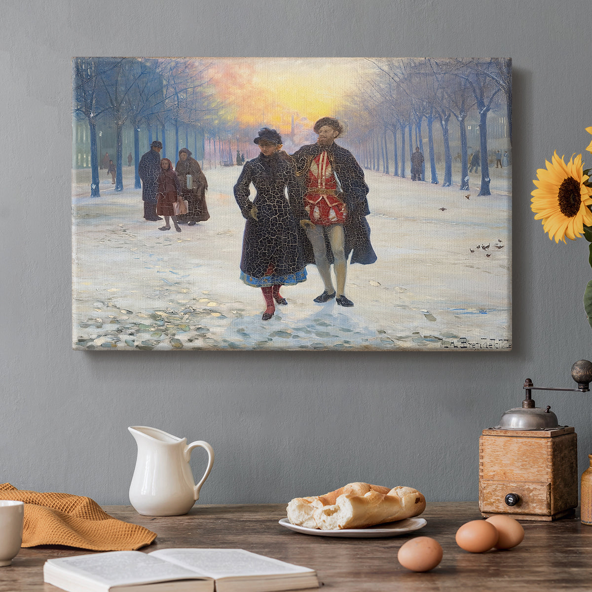 Canvas art print featuring figures walking through snowy street in quiet winter village scene, set in a cozy kitchen setting