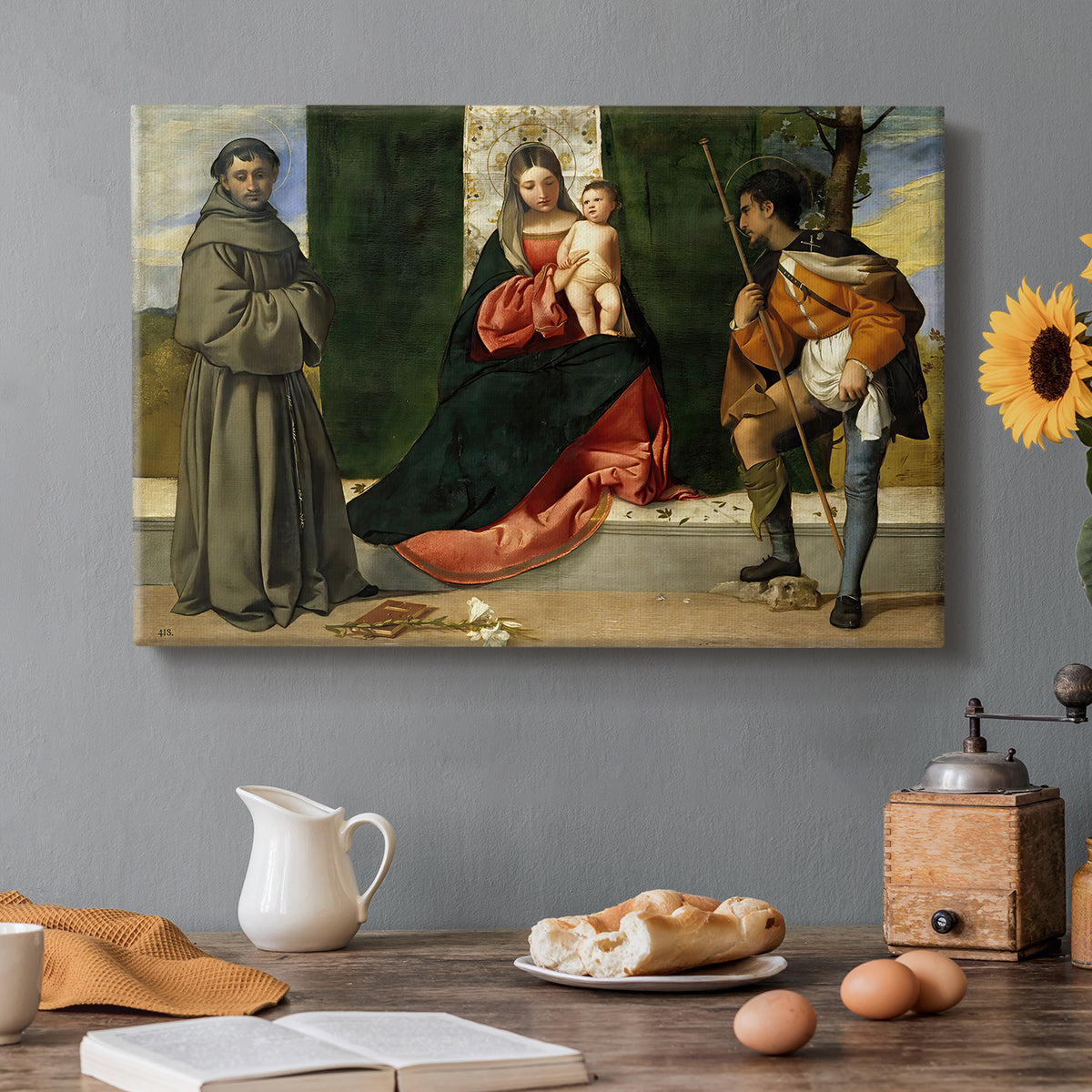 Canvas art print featuring Madonna and child seated with two saints in architectural devotional scene, set in a cozy kitchen setting