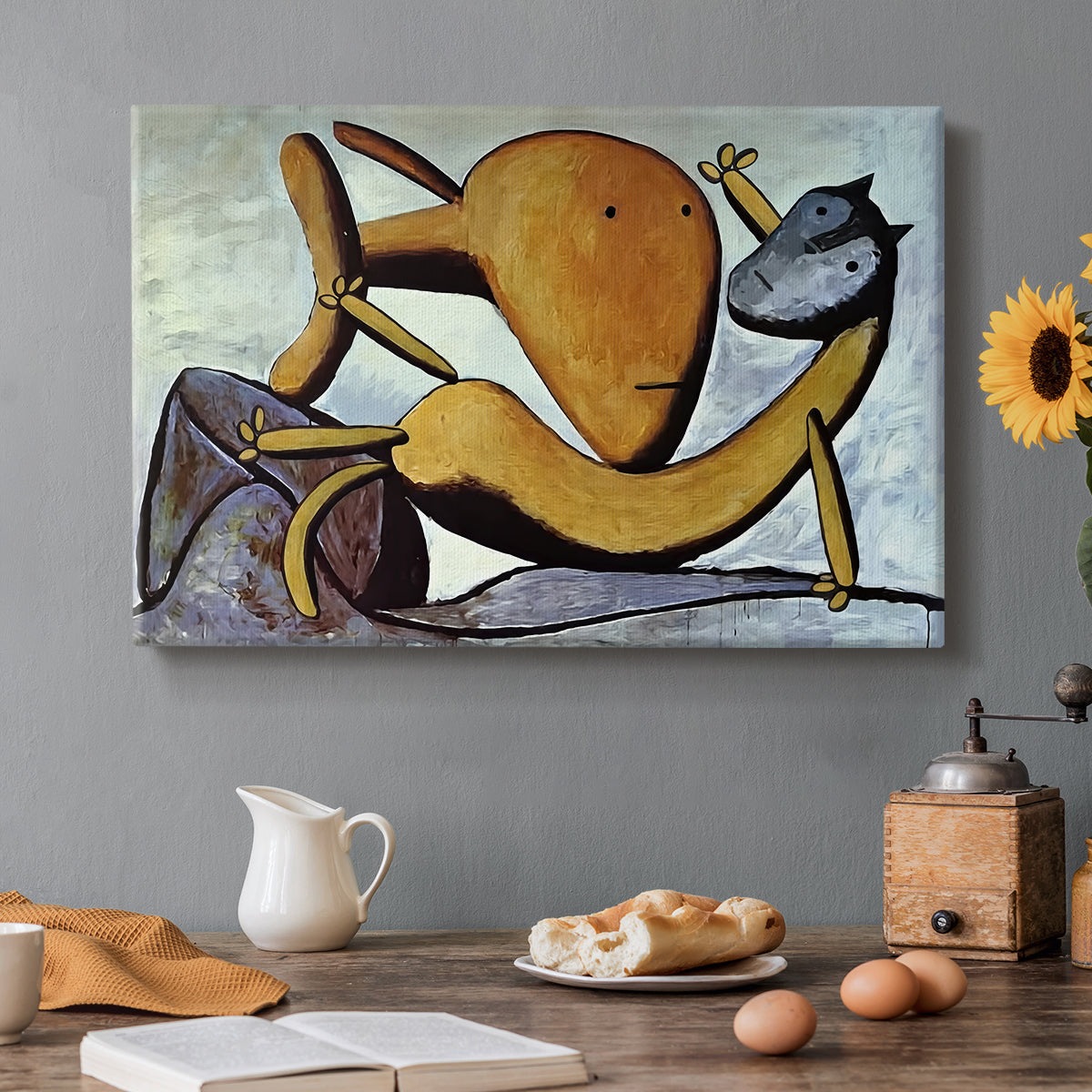 Canvas art print featuring an abstract cat interacting with large fish in simplified form, set in a cozy kitchen setting