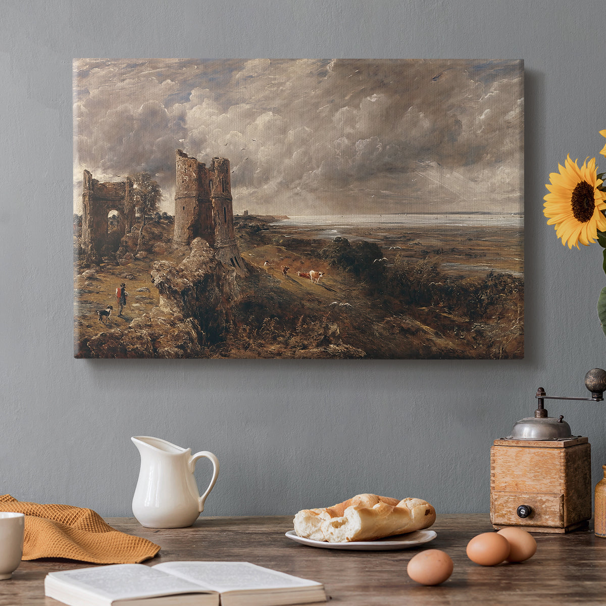 Canvas art print featuring a ruined castle overlooking river and landscape, set in a cozy kitchen setting