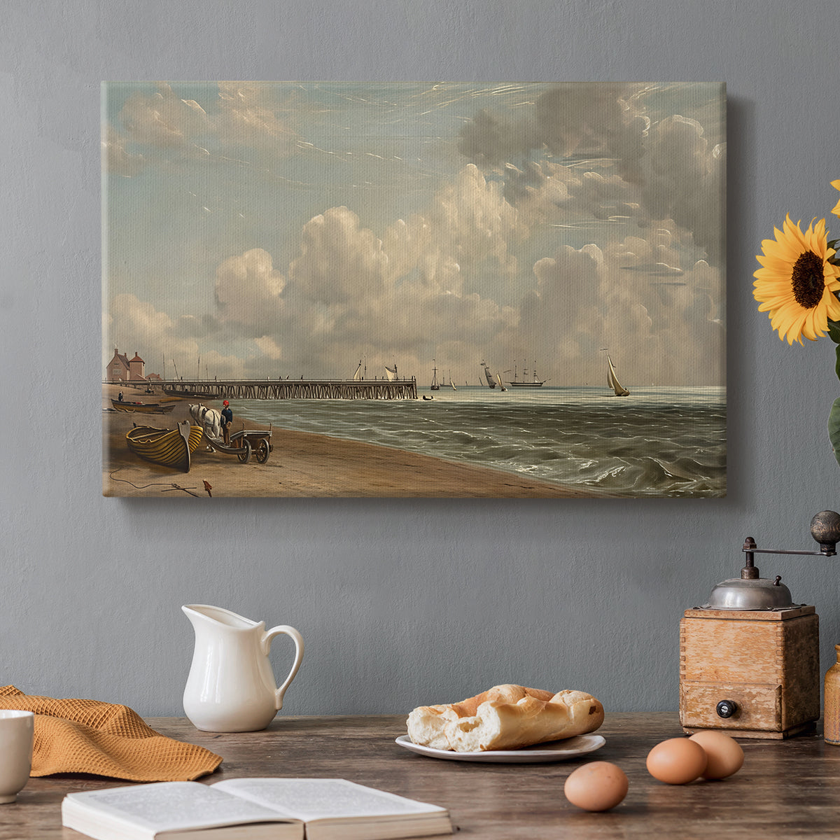Canvas art print featuring a wooden jetty extending into sea with open horizon, set in a cozy kitchen setting