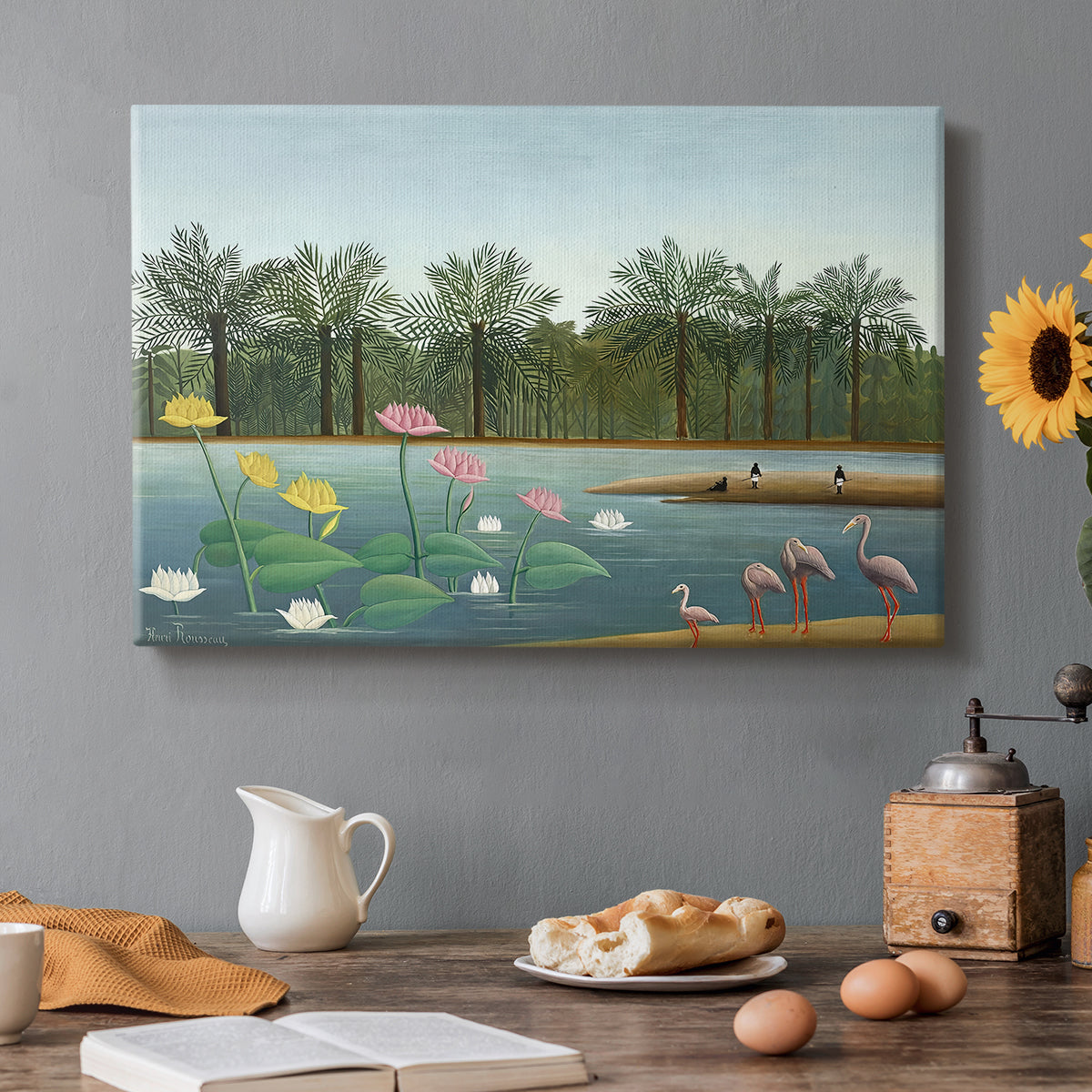 Canvas art print featuring flamingos standing in water surrounded by trees and vegetation, set in a cozy kitchen setting