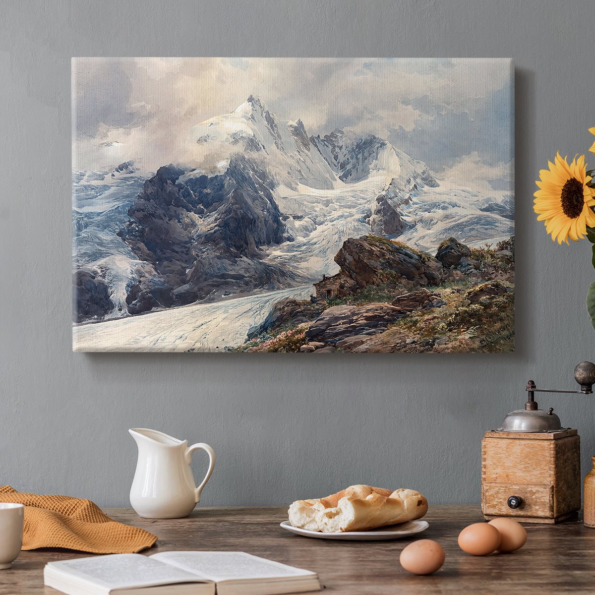 Canvas art print featuring a towering mountain peak rising above rocky alpine landscape, set in a cozy kitchen setting
