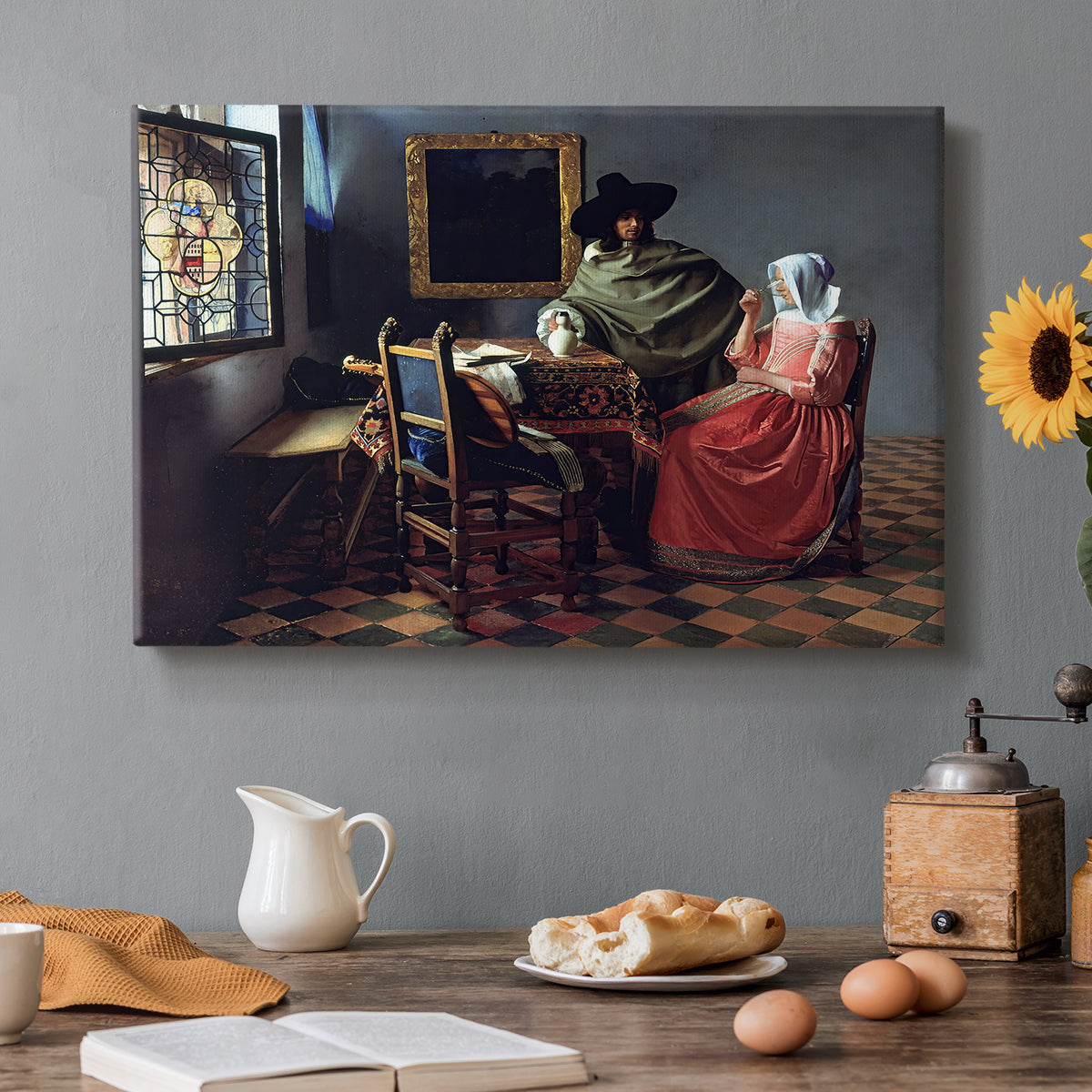 Canvas art print featuring a woman seated at table with man offering glass of wine in interior, set in a cozy kitchen setting