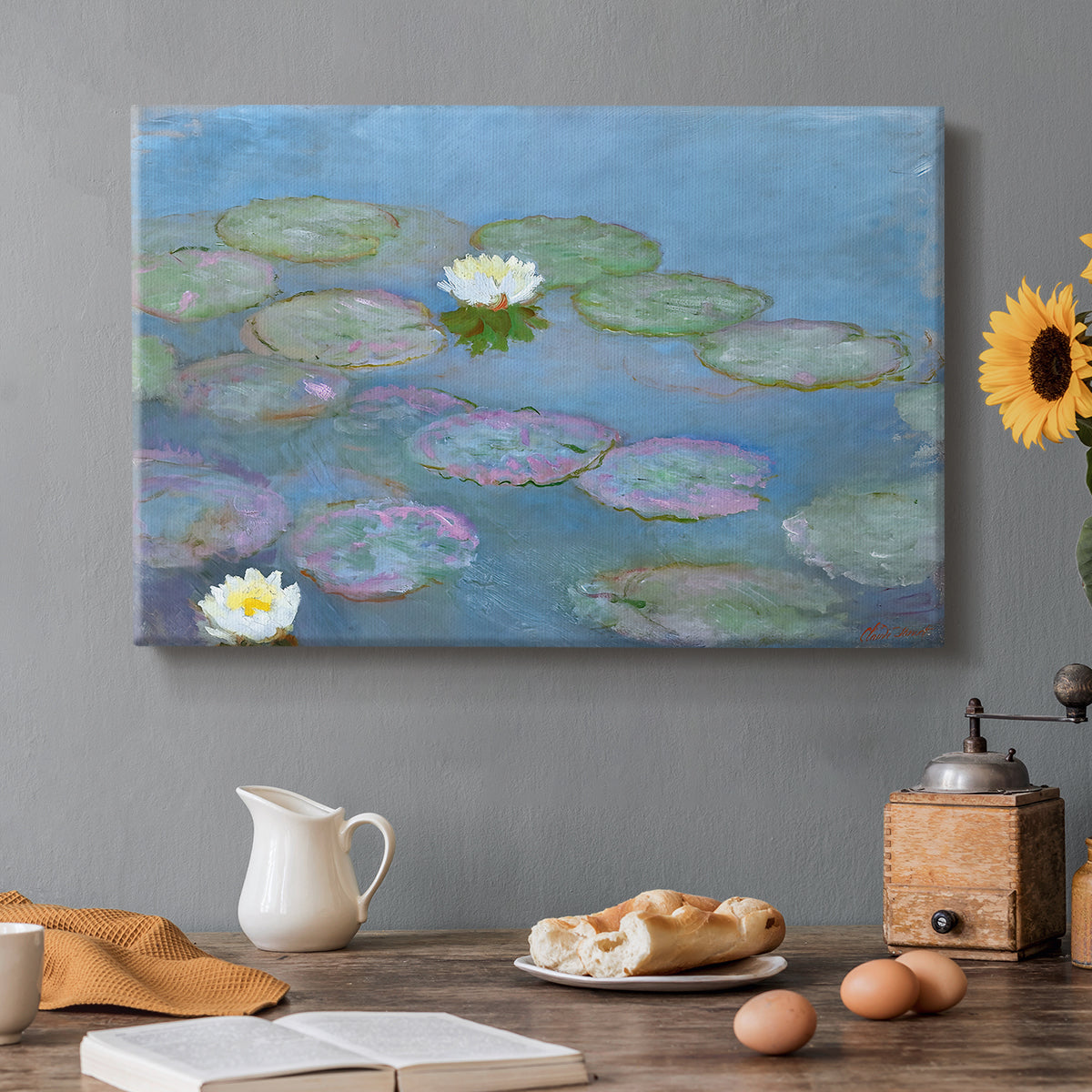Canvas art print featuring floating water lilies on pond with reflections of sky and foliage, set in a cozy kitchen setting