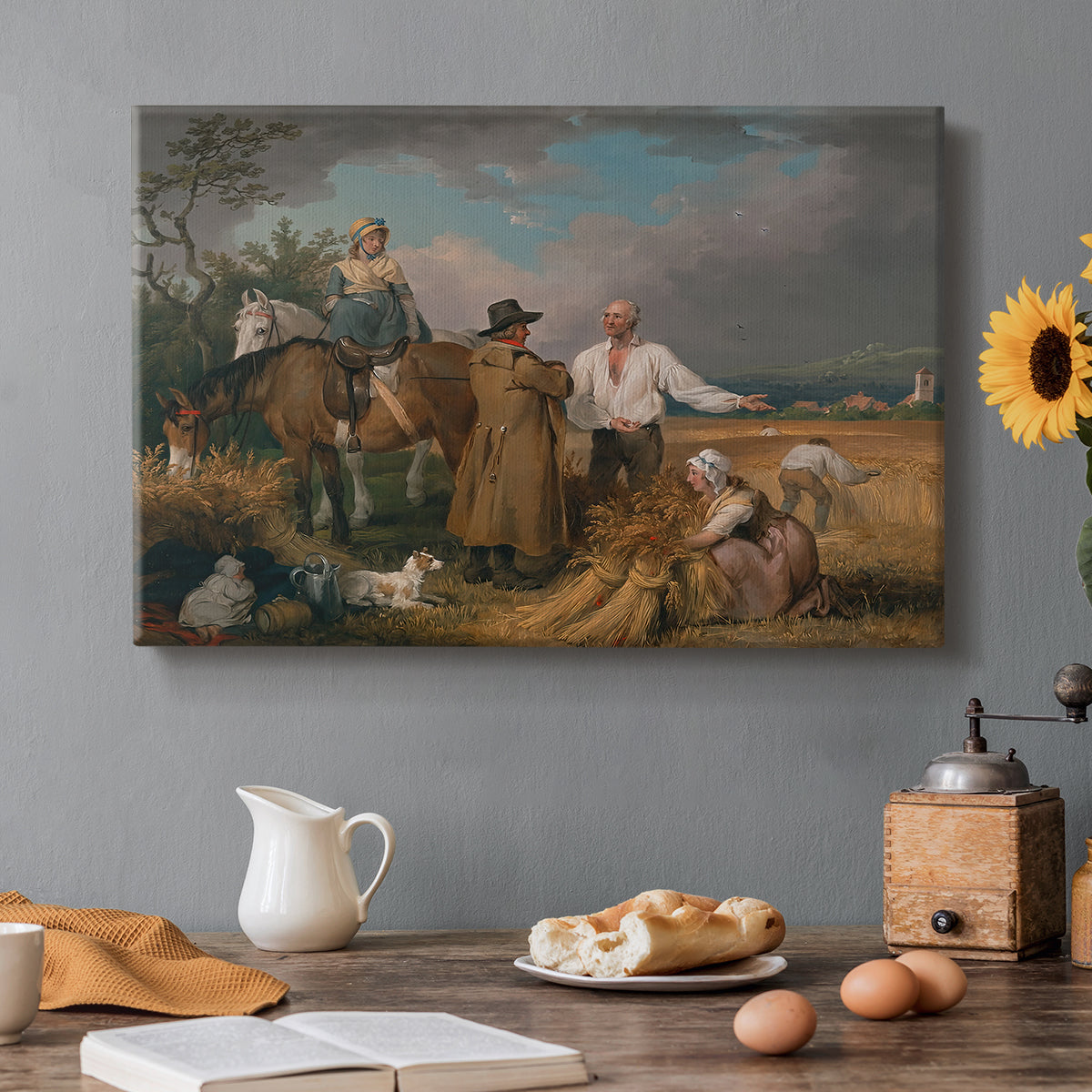 Canvas art print featuring a group of figures harvesting crops in open rural landscape, set in a cozy kitchen setting