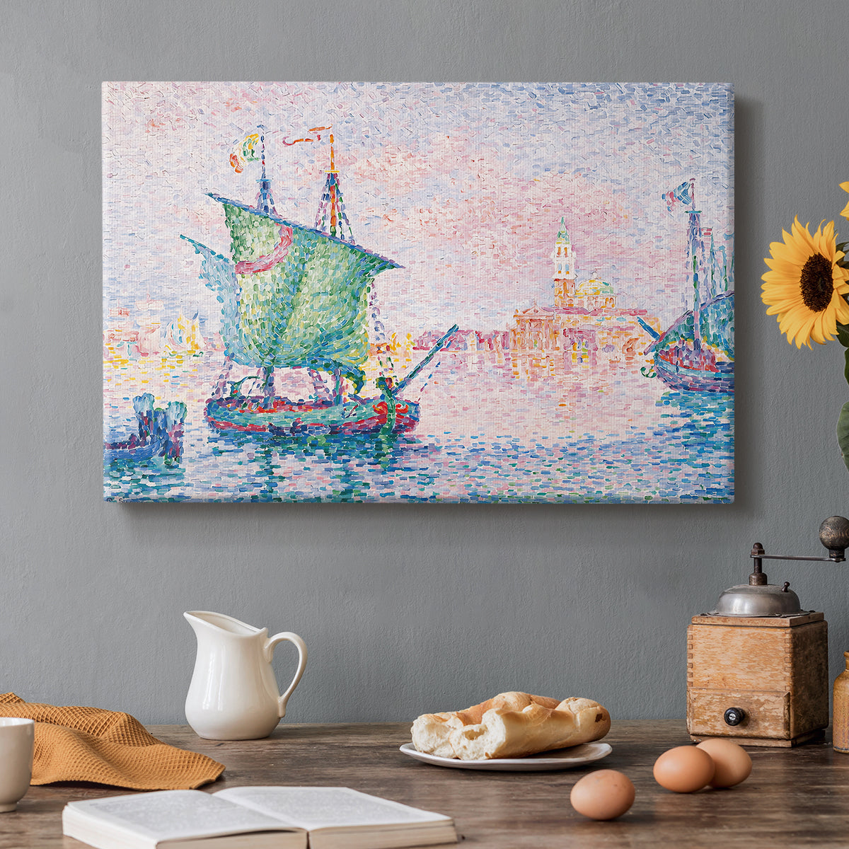 Canvas art print featuring a Venetian waterfront under pink sky, set in a cozy kitchen setting