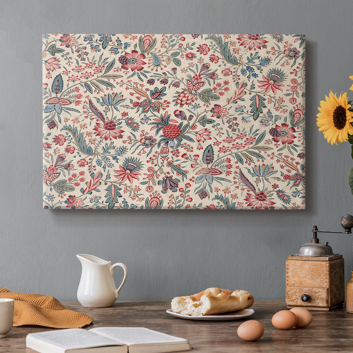 Canvas art print featuring a repeating floral and botanical pattern with intricate detailing on cream background, set in a cozy kitchen setting