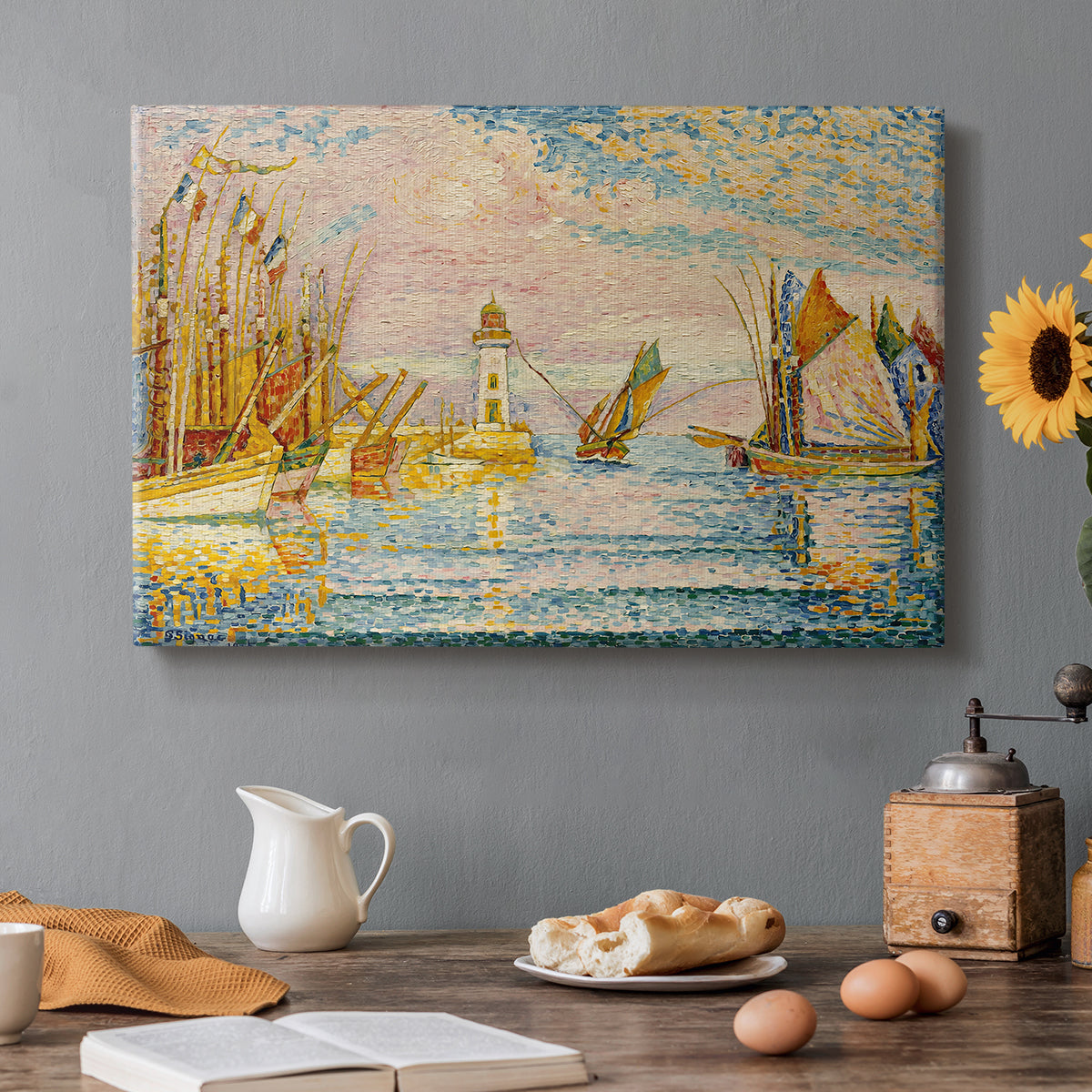 Canvas art print featuring a pointillist landscape of lighthouse and boats, set in a cozy kitchen setting