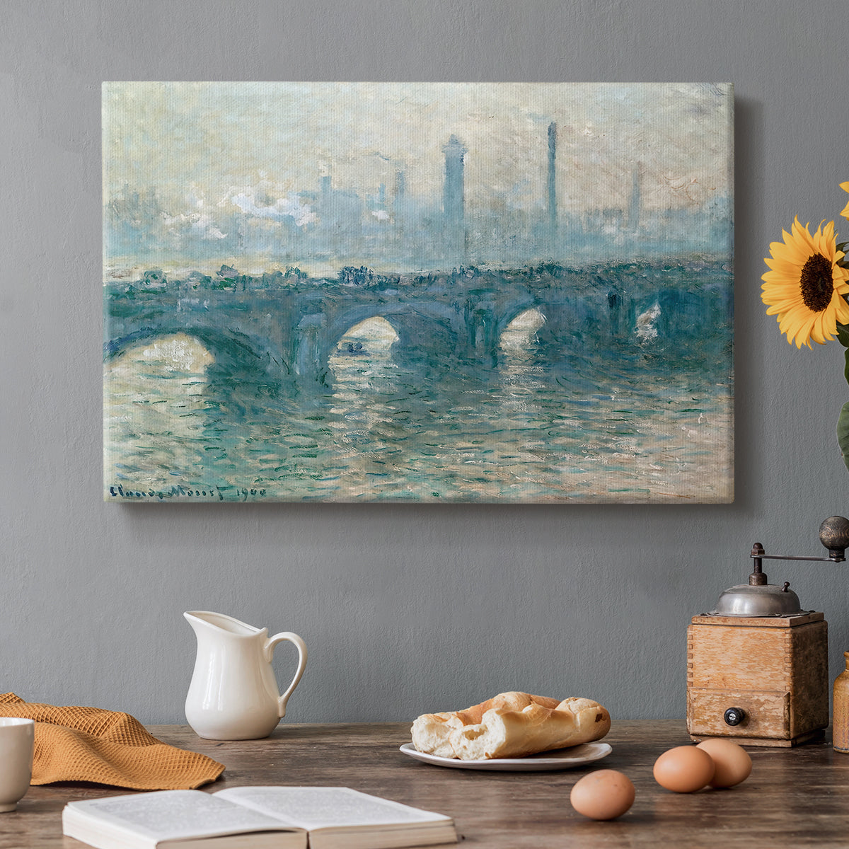 Canvas art print featuring a hazy view of Waterloo Bridge over river in gray atmospheric light, set in a cozy kitchen setting