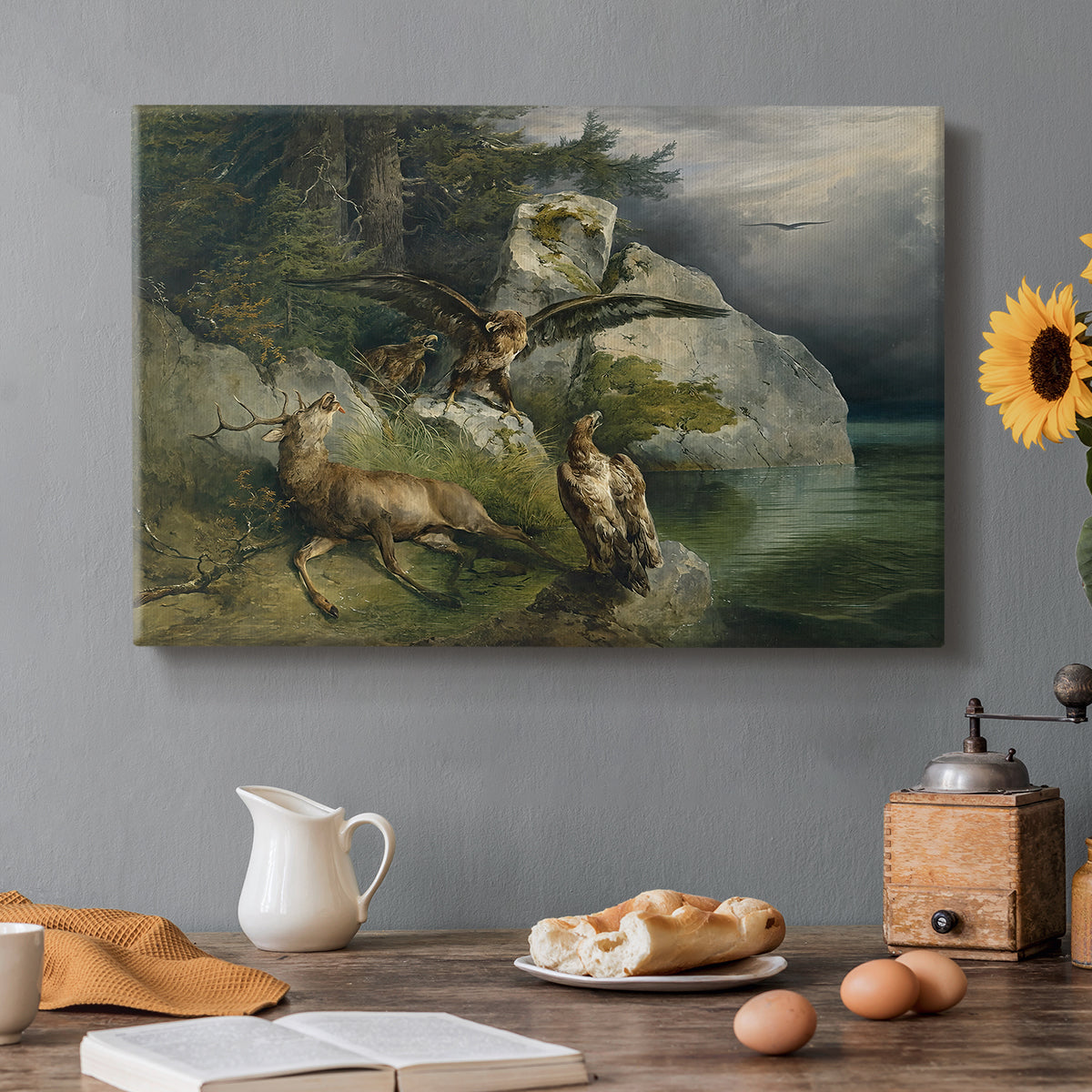 Canvas art print featuring eagles attacking stag near lake, set in a cozy kitchen setting