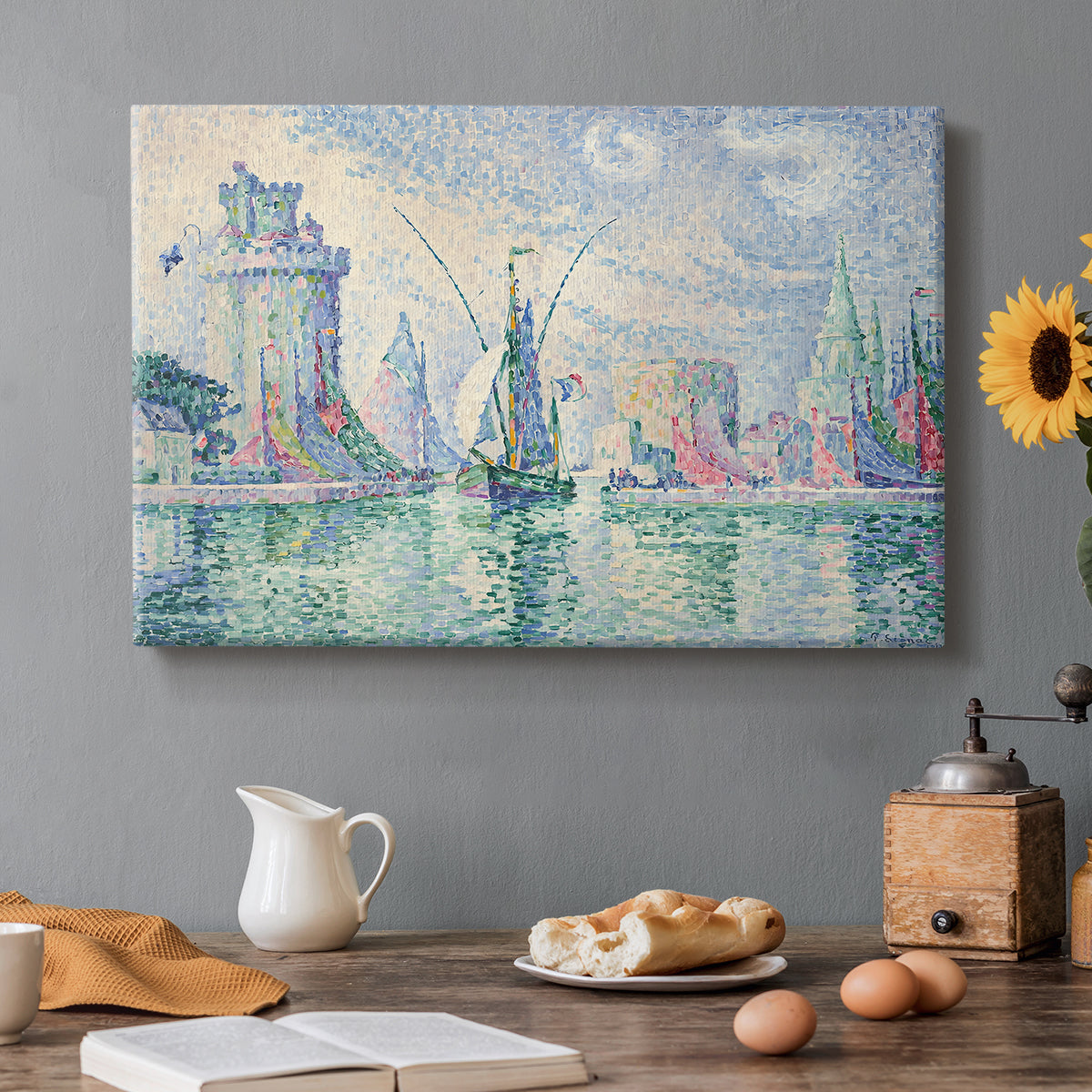 Canvas art print featuring a coastal cityscape with towers along waterfront, set in a cozy kitchen setting