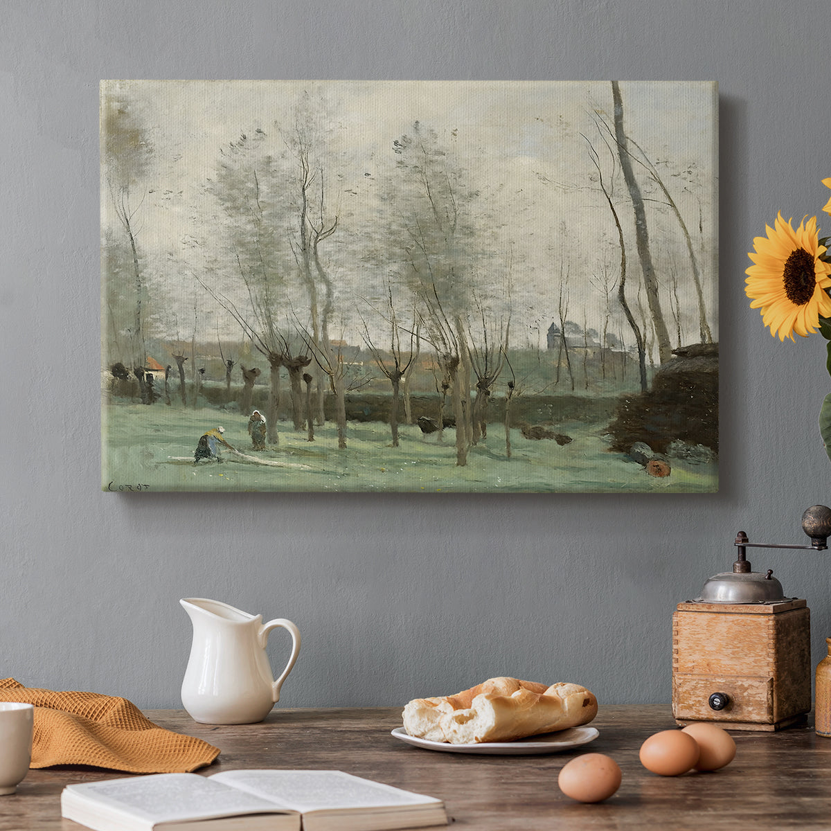 Canvas art print featuring women washing clothes beside water under willow trees, set in a cozy kitchen setting