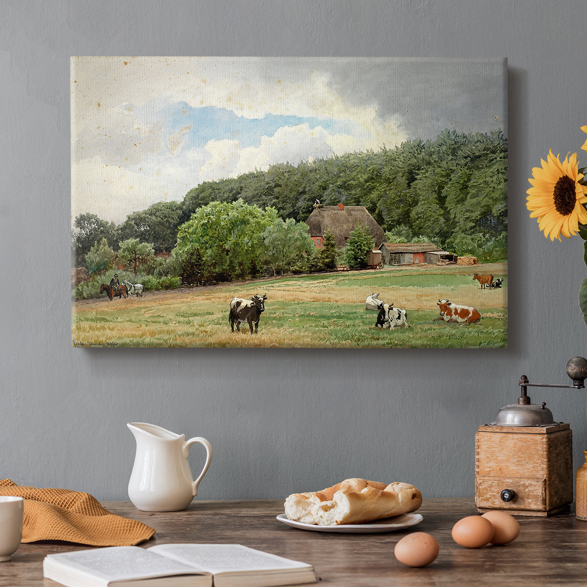 Canvas art print featuring cows grazing in pasture near farmhouse in rural countryside, set in a cozy kitchen setting