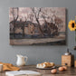 Canvas art print featuring a farmhouse and trees in muted evening landscape, set in a cozy kitchen setting