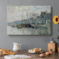 Canvas art print featuring a canal scene with boats and buildings lining waterfront in Amsterdam, set in a cozy kitchen setting