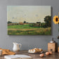 Canvas art print featuring an estate building surrounded by trees and open pastoral landscape, set in a cozy kitchen setting