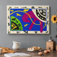Canvas art print featuring abstract figures of a horse, rider, and clown in a bold cut-out composition, set in a cozy kitchen setting