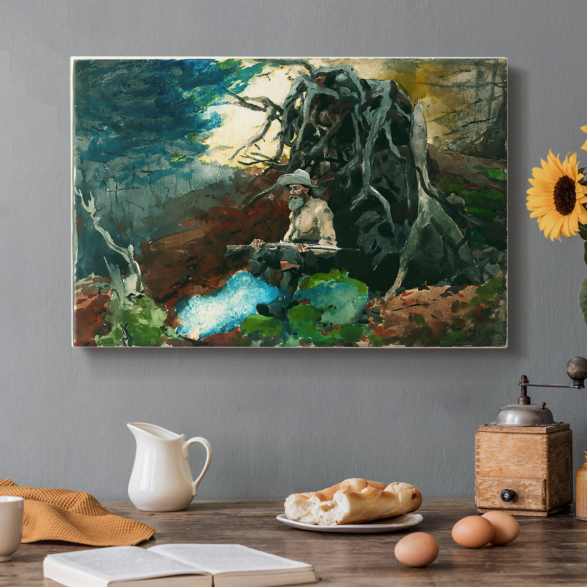 Canvas art print featuring a figure seated near fire in forest clearing surrounded by trees, set in a cozy kitchen setting