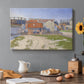 Canvas art print featuring industrial gas structures in urban landscape, set in a cozy kitchen setting