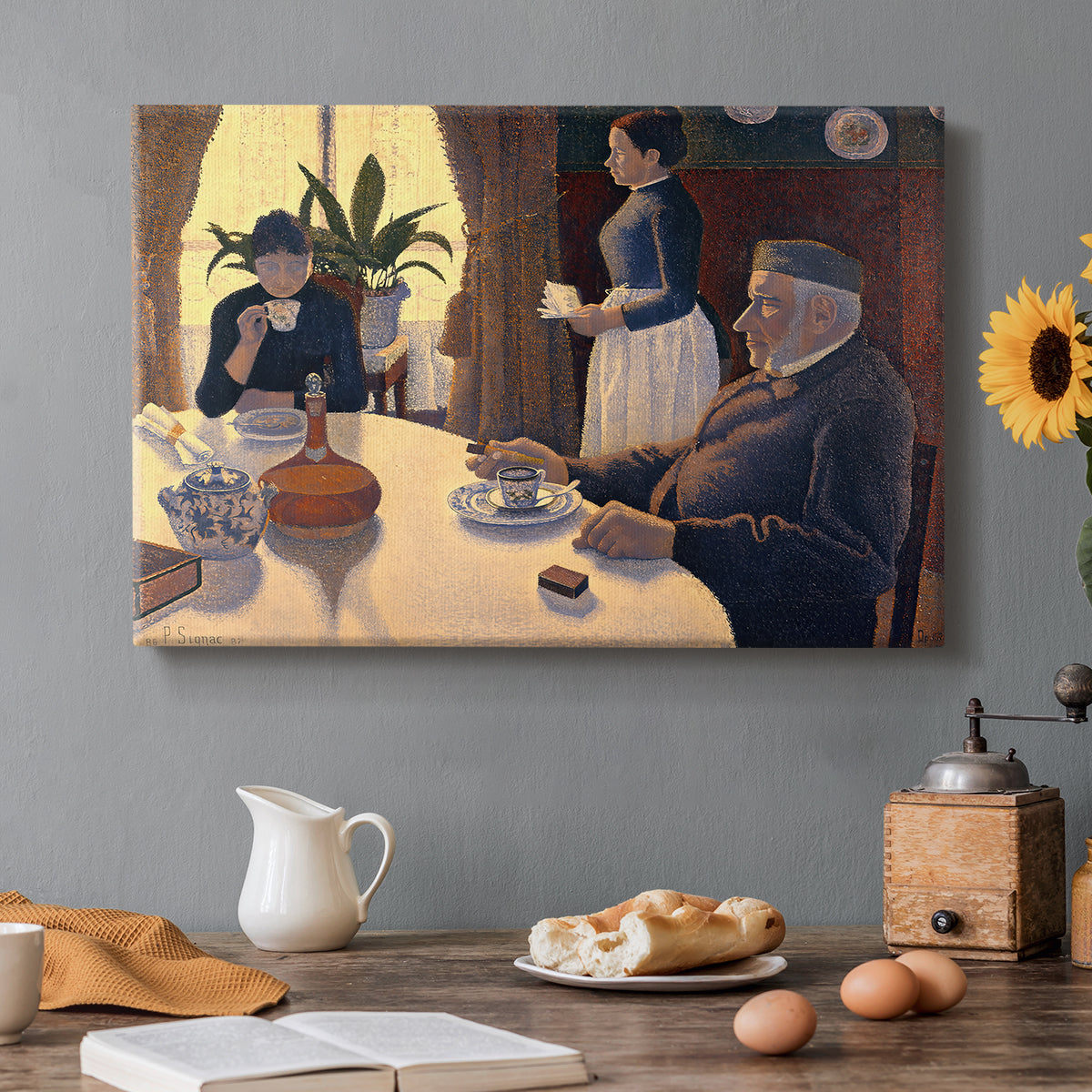 Canvas art print featuring figures seated around table in pointillist interior, set in a cozy kitchen setting
